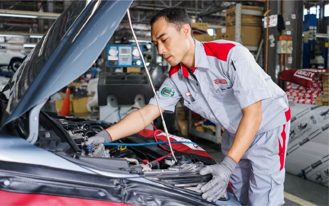 Mechanic Servicing Car - Borneo Mobility